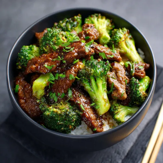 A bowl of beef and broccoli.