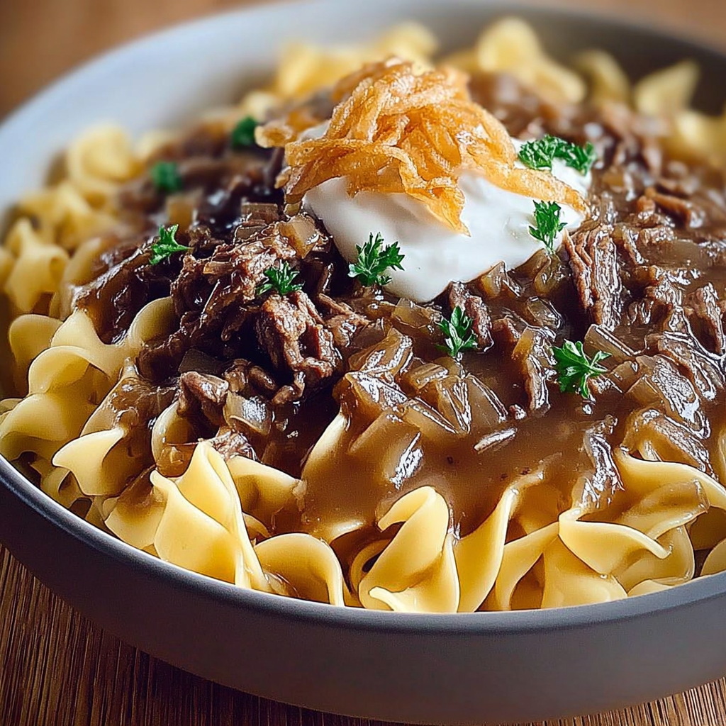A bowl of French onion beef noodles.