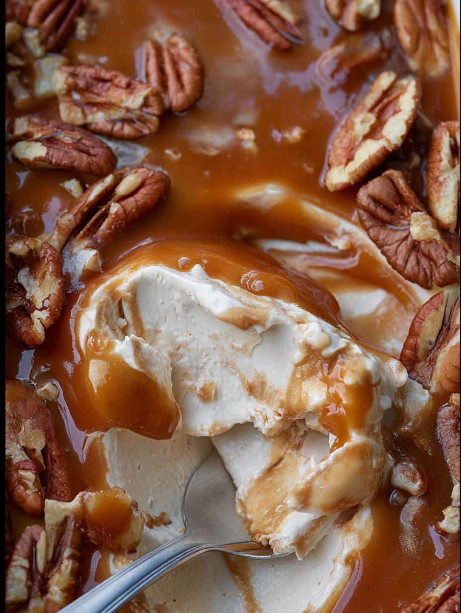 A close up of a caramel apple cheesecake dip.