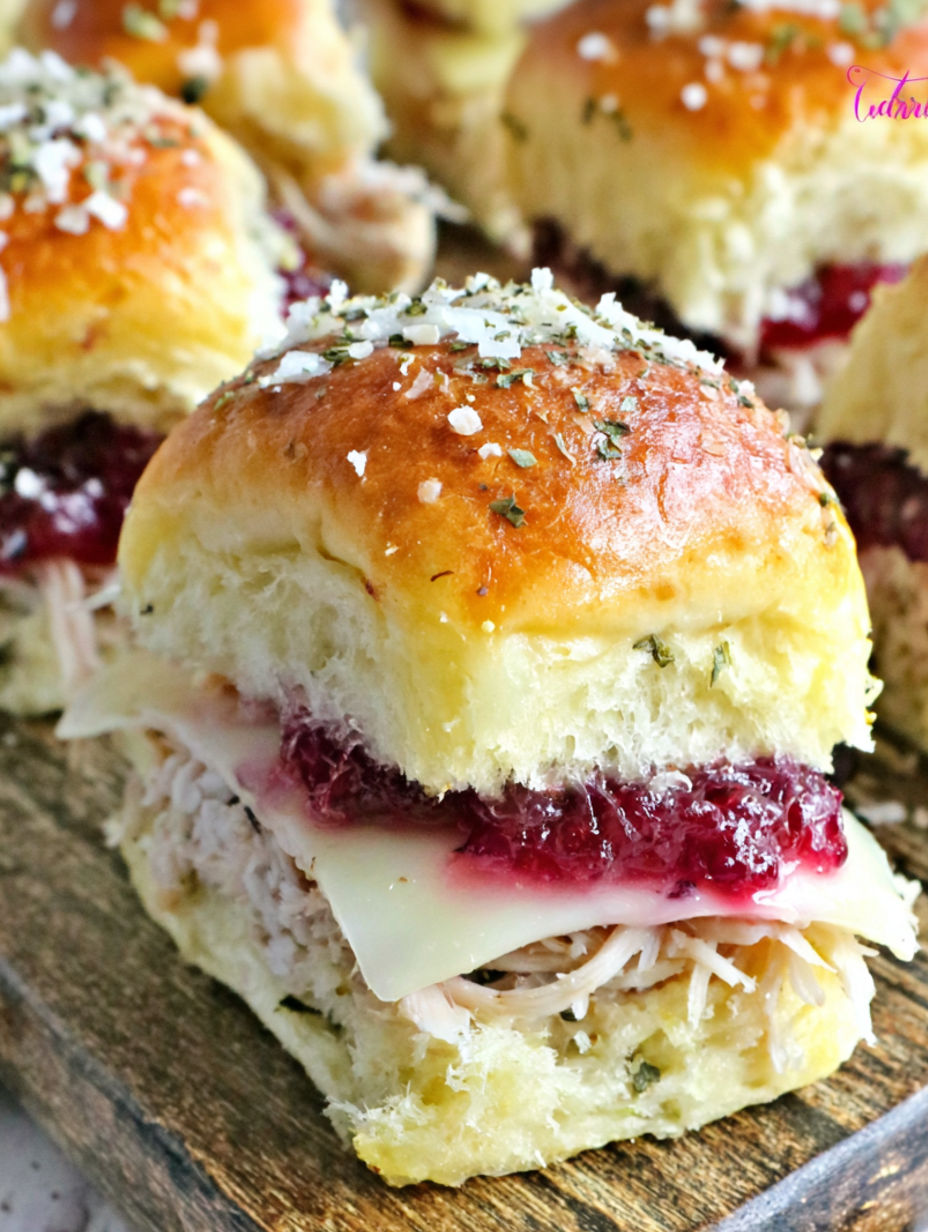 A plate of turkey cranberry sliders.