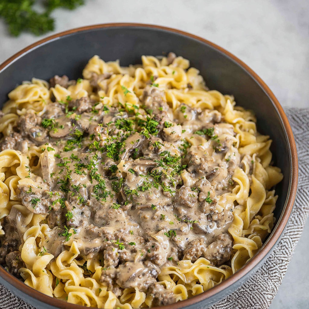 A bowl of ground beef stroganoff.