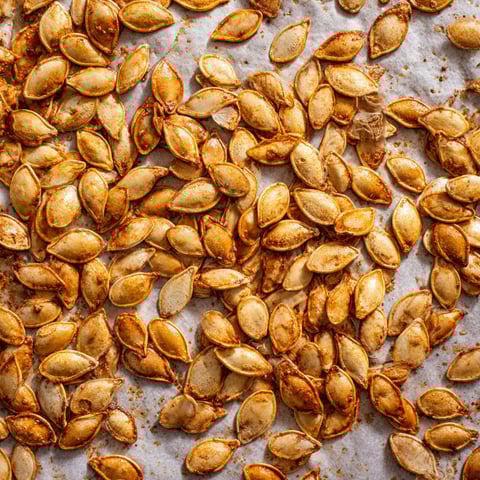 A close up of roasted pumpkin seeds.