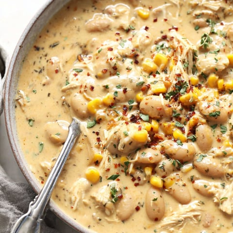 A bowl of white chicken chili.