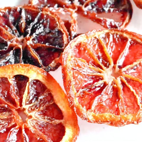 A close up of candied citrus fruit.