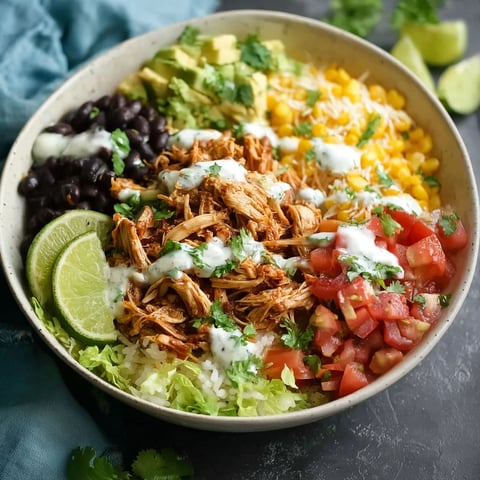 A bowl of food with a variety of ingredients.