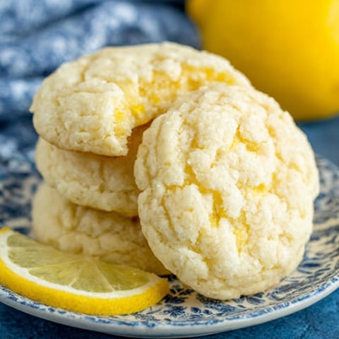 A stack of glazed lemon sugar cookies.
