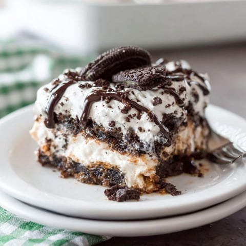 A slice of Oreo lasagna on a plate.